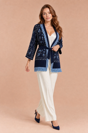 Gilet bleu marine col V franges | Vue en mouvement | Lounelle Paris