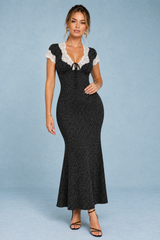 Schwarzes gepunktetes Kleid mit Spitzenbesatz