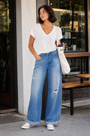 Jean bleu moyen jambe large taille repliée | Deuxième photo lifestyle | Lounelle Paris