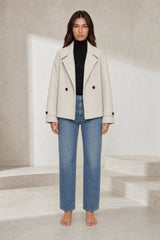 Manteau court écru double boutonnage