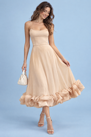 Robe midi beige évasée à bas volanté | Vue de face | Lounelle Paris