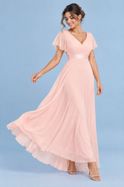 Robe longue plissée rose à col V | Vue en mouvement | Lounelle Paris