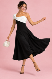 Robe midi noire et blanche asymétrique à une épaule | Vue en mouvement | Lounelle Paris