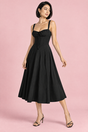 Robe midi noire à coupe trapèze et encolure carrée | Vue de dos | Lounelle Paris