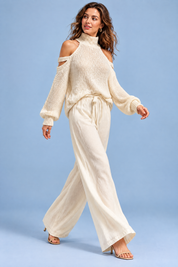 Ensemble pantalon deux pièces oversize écru à découpe | Vue en mouvement | Lounelle Paris