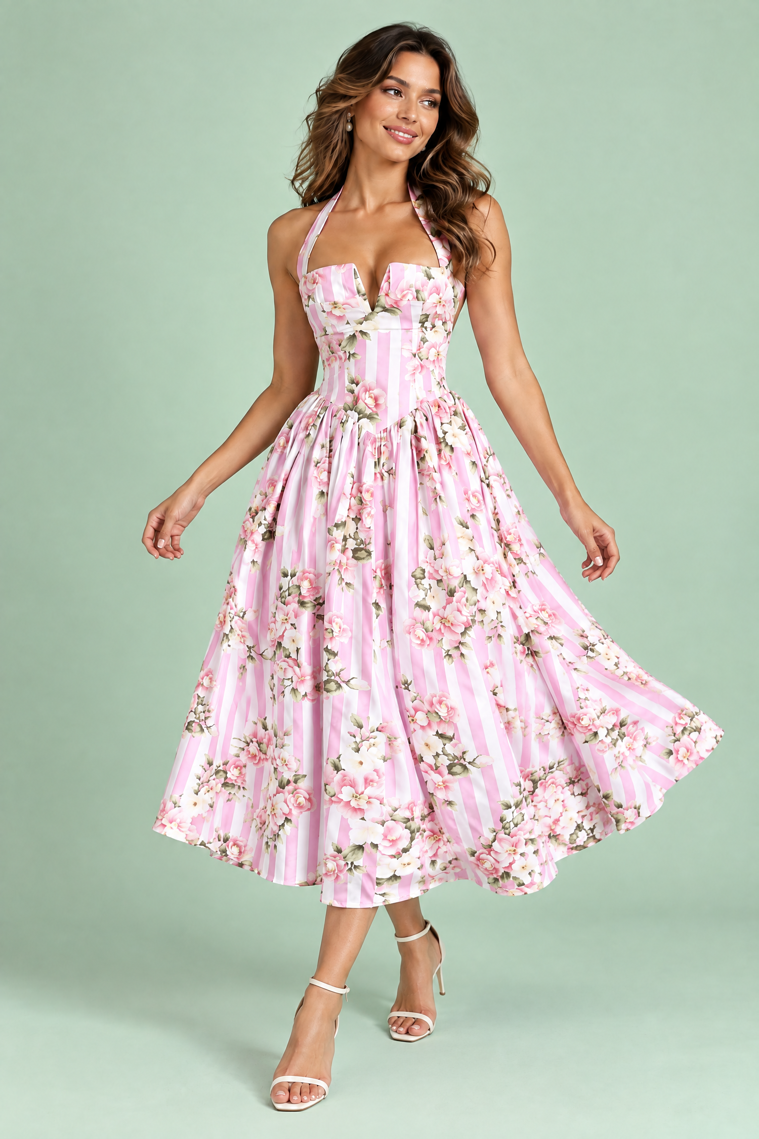 Robe longue rose dos nu à rayures et motifs floraux | Vue en mouvement | Lounelle Paris