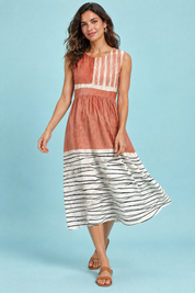 Robe midi corail rayée sans manches | Vue en mouvement | Lounelle Paris