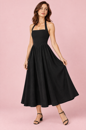 Robe midi patineuse noire à encolure américaine | Vue de dos | Lounelle Paris