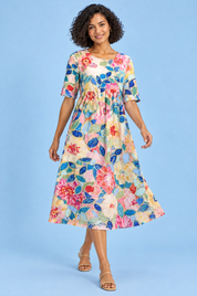 Robe midi trapèze à motif floral blanc cassé | Vue en mouvement | Lounelle Paris