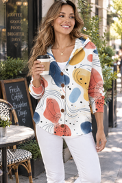Gilet blanc à capuche boutonné | Photo lifestyle | Lounelle Paris