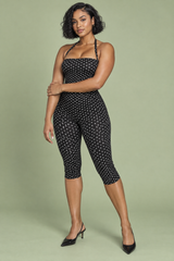 Schwarzer, taillierter Jumpsuit mit Punkten