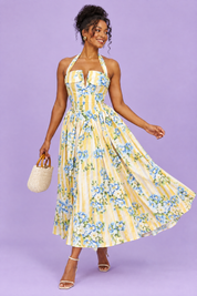 Robe longue jaune dos nu à rayures et motifs floraux | Vue en mouvement | Lounelle Paris