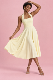 Robe midi patineuse jaune clair à col américain | Vue en mouvement | Lounelle Paris
