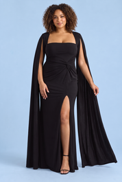 Robe longue moulante noire à encolure carrée, effet torsadé et manches façon cape | Porté sur une silhouette plus ronde | Lounelle Paris